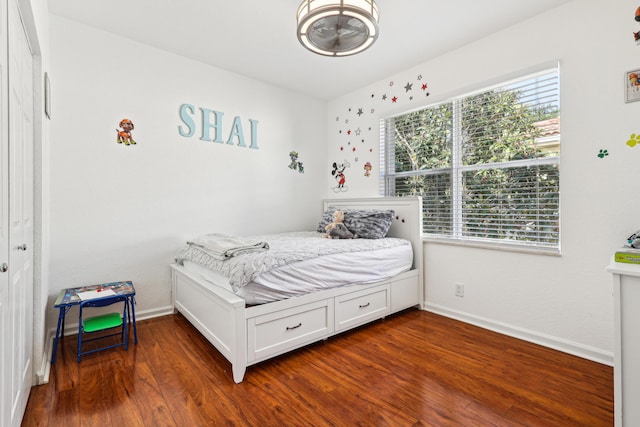 1070 Grove Park Cir, Boynton Beach, FL 33436 - bedroom with baseboards and dark wood-style floors