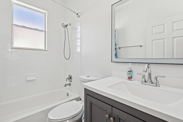 1070 Grove Park Cir, Boynton Beach, FL 33436 - bathroom with shower / bathtub combination, toilet, and vanity