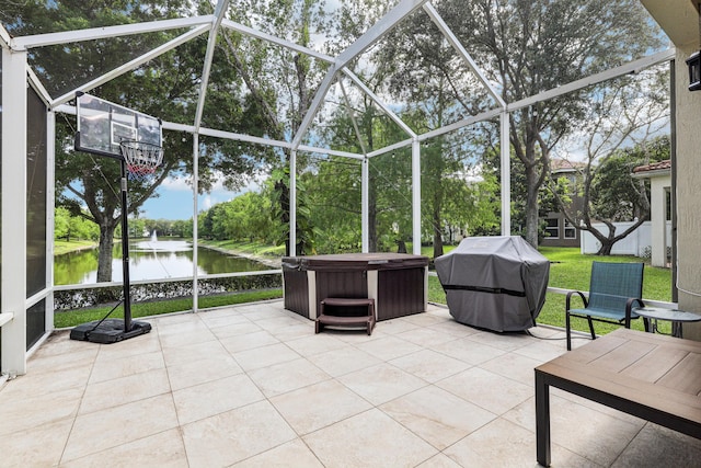 1070 Grove Park Cir, Boynton Beach, FL 33436 - sunroom / solarium featuring a hot tub and a water view