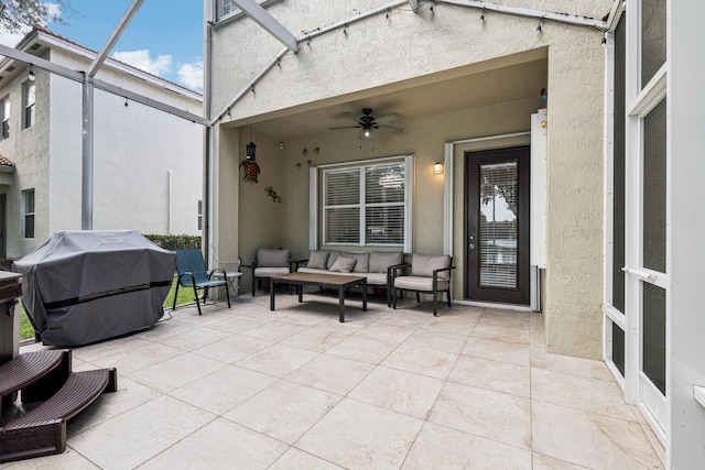 1070 Grove Park Cir, Boynton Beach, FL 33436 - view of patio featuring glass enclosure, a ceiling fan, area for grilling, and an outdoor living space
