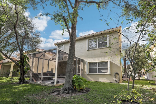 1070 Grove Park Cir, Boynton Beach, FL 33436 - back of property featuring a yard, a lanai, a patio, and stucco siding