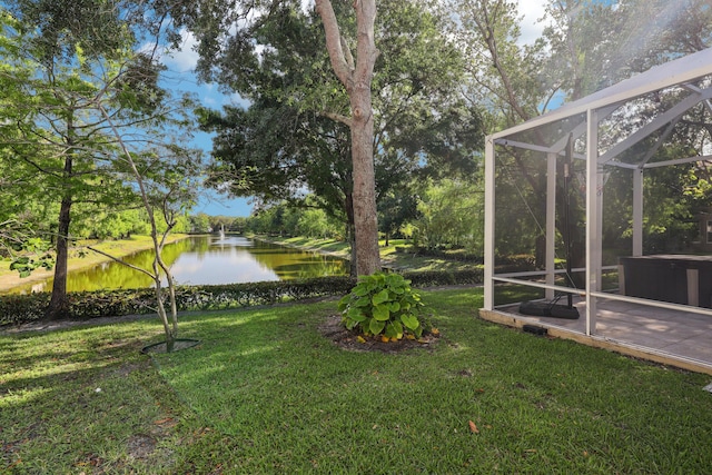 1070 Grove Park Cir, Boynton Beach, FL 33436 - view of yard with a lanai and a water view