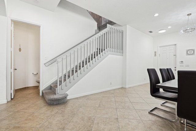1070 Grove Park Cir, Boynton Beach, FL 33436 - tiled dining space featuring baseboards, visible vents, a chandelier, recessed lighting, and stairs