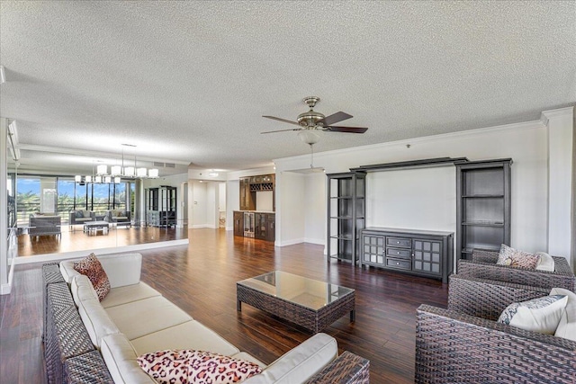 7572 Regency Lake Dr Unit 501, Boca Raton, FL 33433 - living room featuring a textured ceiling, ceiling fan, wood finished floors, ornamental molding, and baseboards