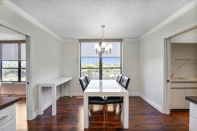 7572 Regency Lake Dr Unit 501, Boca Raton, FL 33433 - dining space with a textured ceiling, a chandelier, dark wood finished floors, crown molding, and baseboards