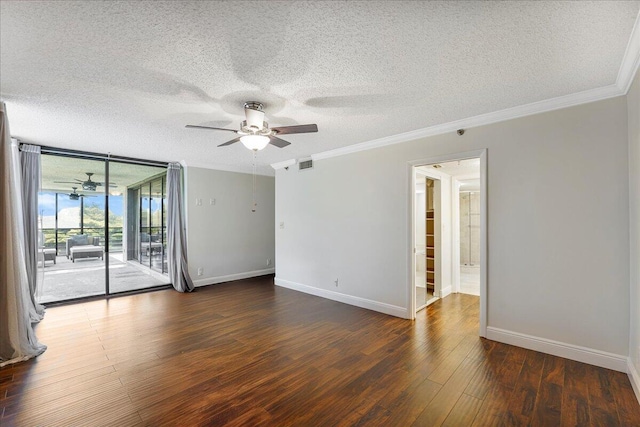 7572 Regency Lake Dr Unit 501, Boca Raton, FL 33433 - spare room with ceiling fan, ornamental molding, a textured ceiling, wood finished floors, and baseboards