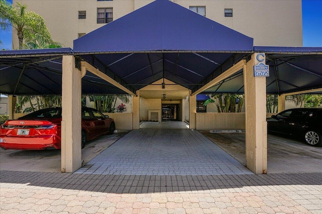 7572 Regency Lake Dr Unit 501, Boca Raton, FL 33433 - view of covered parking lot