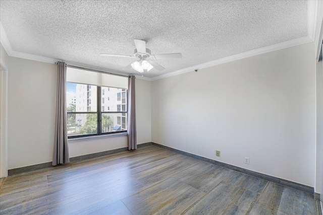 7572 Regency Lake Dr Unit 501, Boca Raton, FL 33433 - spare room with dark wood finished floors, ceiling fan, a textured ceiling, crown molding, and baseboards