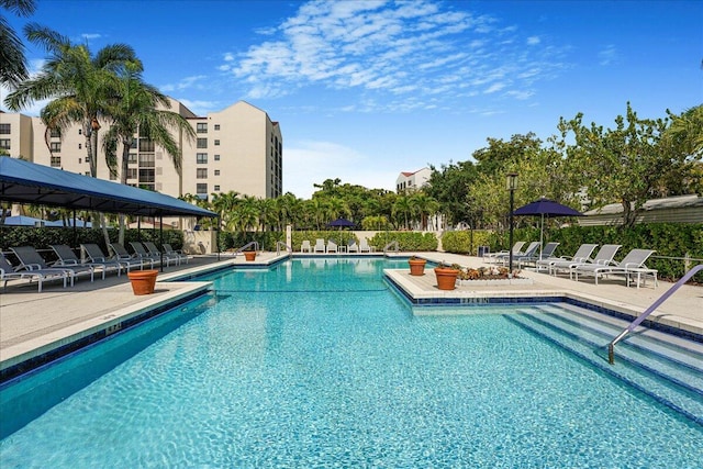 7572 Regency Lake Dr Unit 501, Boca Raton, FL 33433 - community pool with a gazebo and a patio