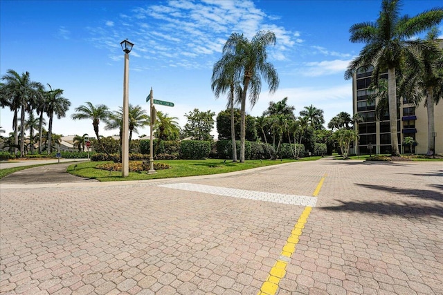 7572 Regency Lake Dr Unit 501, Boca Raton, FL 33433 - view of road with street lighting and traffic signs