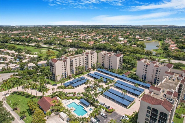7572 Regency Lake Dr Unit 501, Boca Raton, FL 33433 - aerial view of a pool area, a large body of water, and apartment complex