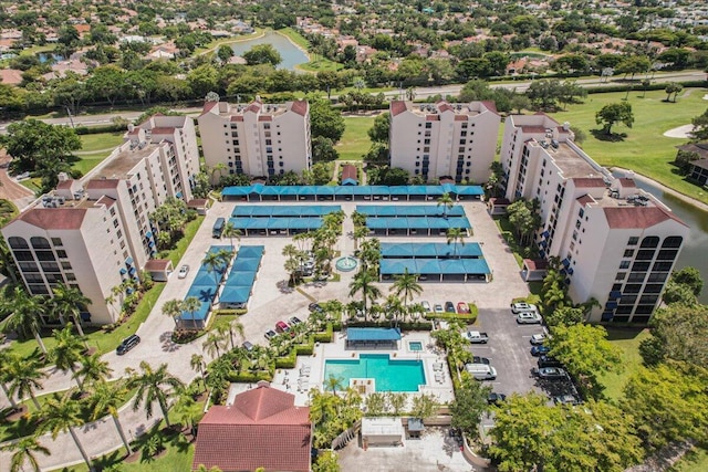 7572 Regency Lake Dr Unit 501, Boca Raton, FL 33433 - aerial view of a pool area, apartment complex, and a large body of water