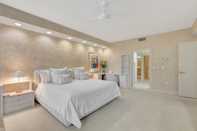 bedroom with light colored carpet, visible vents, and recessed lighting