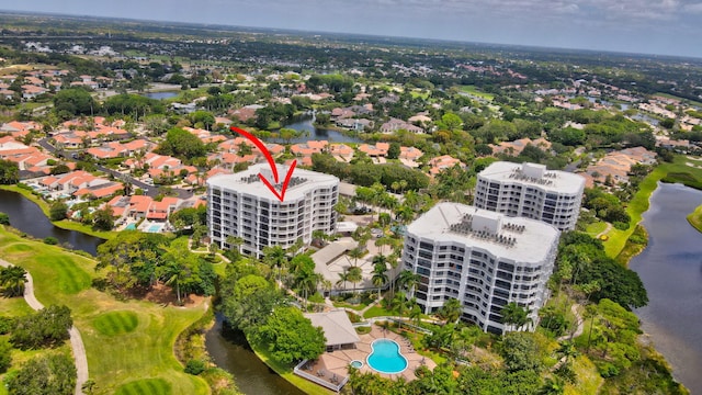 aerial view featuring a water view and golf course view
