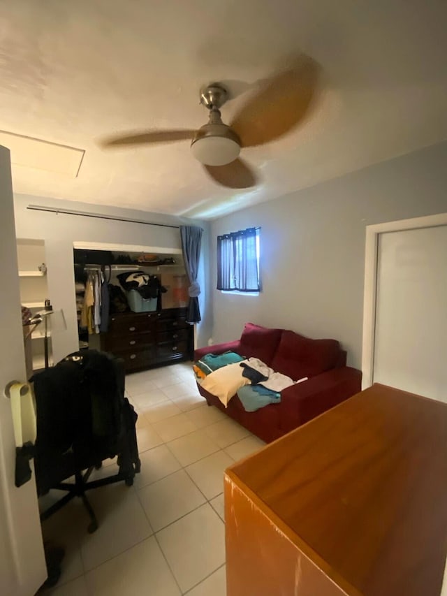 bedroom featuring ceiling fan and light tile patterned floors