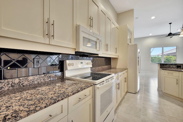 5266 Landon Cir, Boynton Beach, FL 33437 - kitchen with white appliances, a ceiling fan, recessed lighting, dark stone countertops, and decorative backsplash