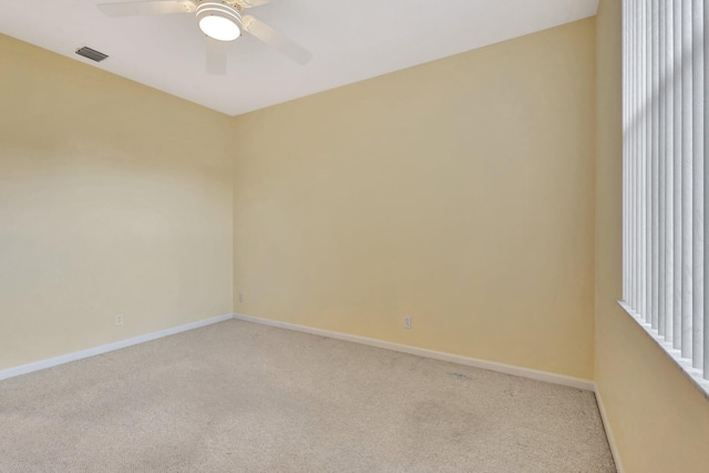 5266 Landon Cir, Boynton Beach, FL 33437 - unfurnished room with visible vents, light colored carpet, baseboards, and a ceiling fan