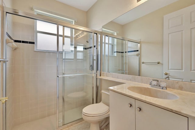 5266 Landon Cir, Boynton Beach, FL 33437 - bathroom with toilet, a shower stall, and vanity