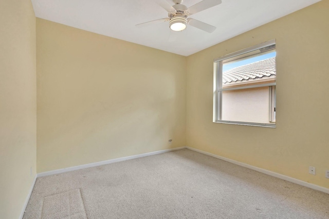 5266 Landon Cir, Boynton Beach, FL 33437 - spare room with baseboards, carpet flooring, and ceiling fan