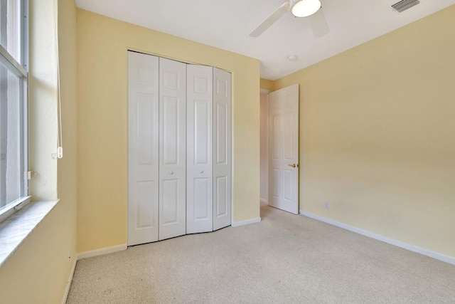 5266 Landon Cir, Boynton Beach, FL 33437 - unfurnished bedroom featuring visible vents, a closet, baseboards, and carpet floors