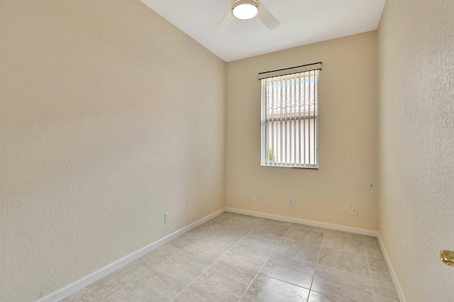 5266 Landon Cir, Boynton Beach, FL 33437 - empty room featuring ceiling fan, baseboards, and light tile patterned floors