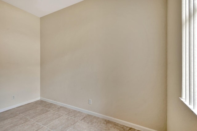 5266 Landon Cir, Boynton Beach, FL 33437 - spare room with light tile patterned floors and baseboards
