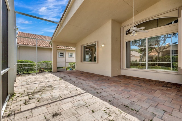 5266 Landon Cir, Boynton Beach, FL 33437 - view of patio / terrace with ceiling fan and glass enclosure