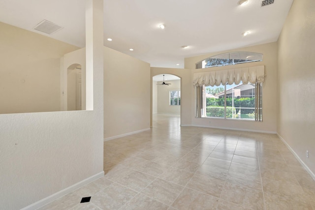 5266 Landon Cir, Boynton Beach, FL 33437 - spare room featuring arched walkways, tile patterned flooring, visible vents, recessed lighting, and baseboards