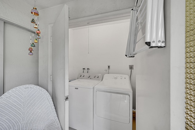 laundry area with independent washer and dryer and laundry area