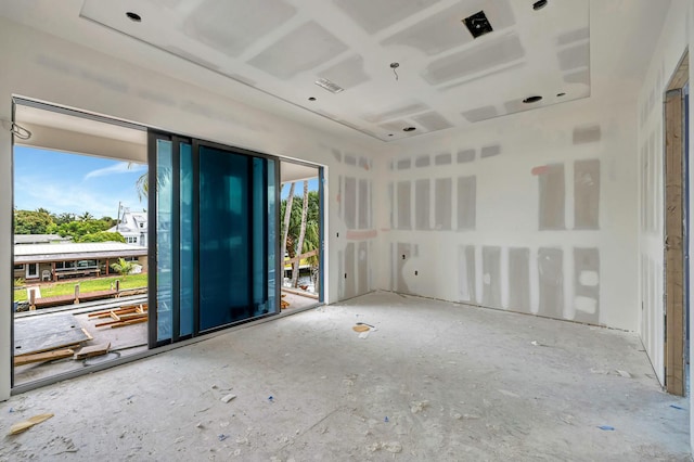 unfurnished room with a healthy amount of sunlight