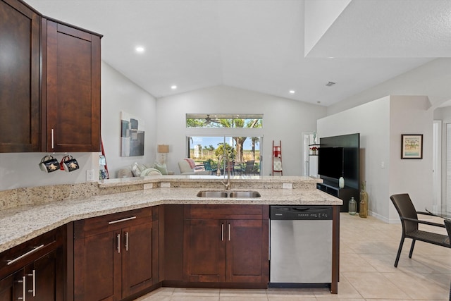 kitchen featuring light stone countertops, a sink, a peninsula, vaulted ceiling, and dishwasher