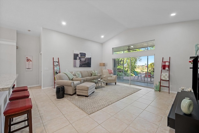 living area featuring baseboards, high vaulted ceiling, light tile patterned flooring, and recessed lighting