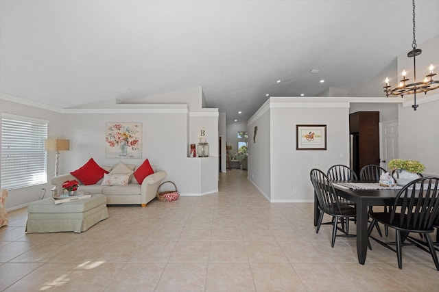 living area featuring lofted ceiling, light tile patterned floors, recessed lighting, and a notable chandelier