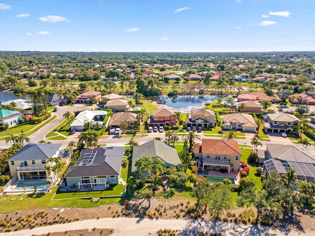 aerial view featuring a residential view and a water view