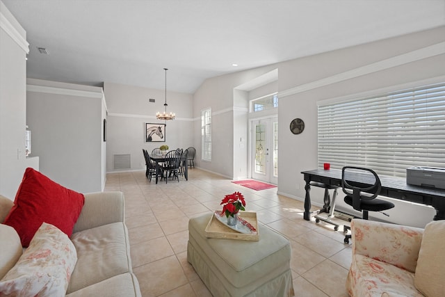 living area with lofted ceiling, light tile patterned floors, a chandelier, visible vents, and baseboards