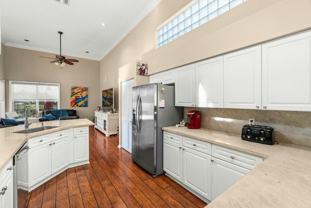 2476 NW 67th St, Boca Raton, FL 33496 - kitchen with a towering ceiling, open floor plan, crown molding, stainless steel appliances, and a sink