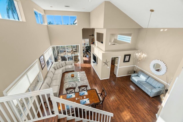 2476 NW 67th St, Boca Raton, FL 33496 - living room with a high ceiling, wood-type flooring, and a wealth of natural light