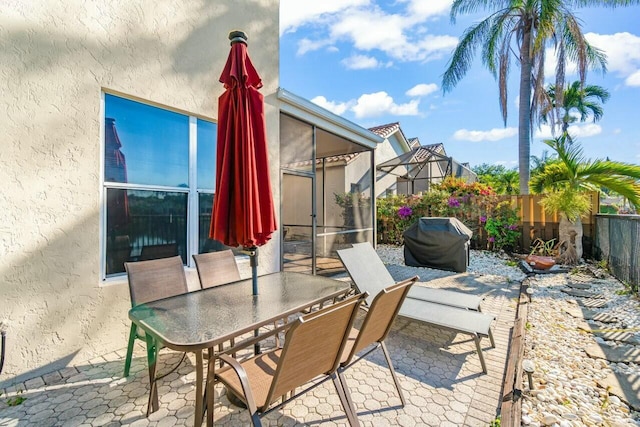 2476 NW 67th St, Boca Raton, FL 33496 - view of patio / terrace with area for grilling, outdoor dining space, and a fenced backyard