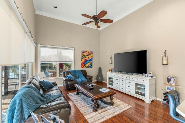 2476 NW 67th St, Boca Raton, FL 33496 - living area featuring crown molding, ceiling fan, hardwood / wood-style floors, a high ceiling, and baseboards