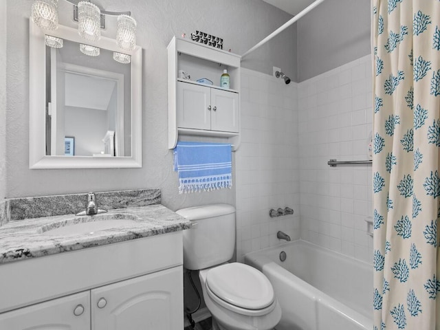 2800 Indian River Blvd Unit F8, Vero Beach, FL 32960 - bathroom featuring vanity, shower / tub combo, and a textured wall