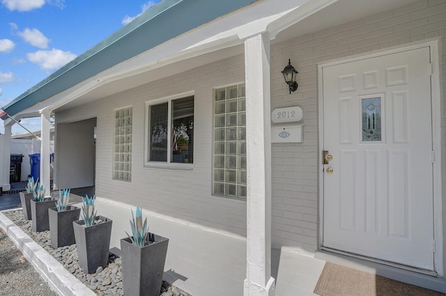 property entrance with a porch