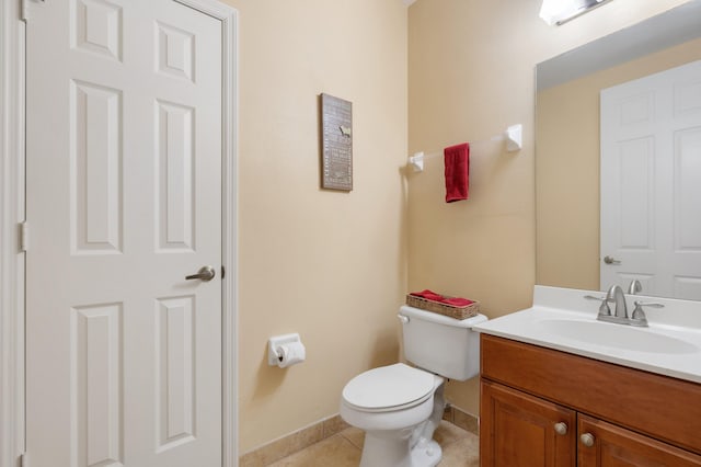 328 W Pine St Unit 22, Lantana, FL 33462 - half bath featuring baseboards, toilet, tile patterned flooring, and vanity