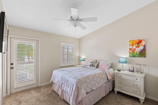 328 W Pine St Unit 22, Lantana, FL 33462 - bedroom featuring baseboards, dark colored carpet, access to exterior, and ceiling fan