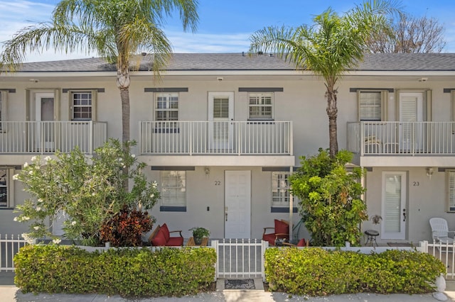 328 W Pine St Unit 22, Lantana, FL 33462 - view of building exterior with a fenced front yard