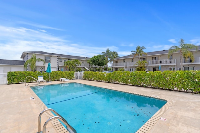 328 W Pine St Unit 22, Lantana, FL 33462 - community pool with a residential view