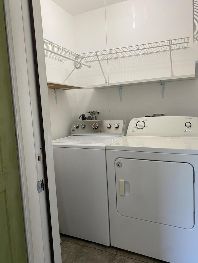 563 Capri L, Delray Beach, FL 33484 - washroom featuring washer and clothes dryer