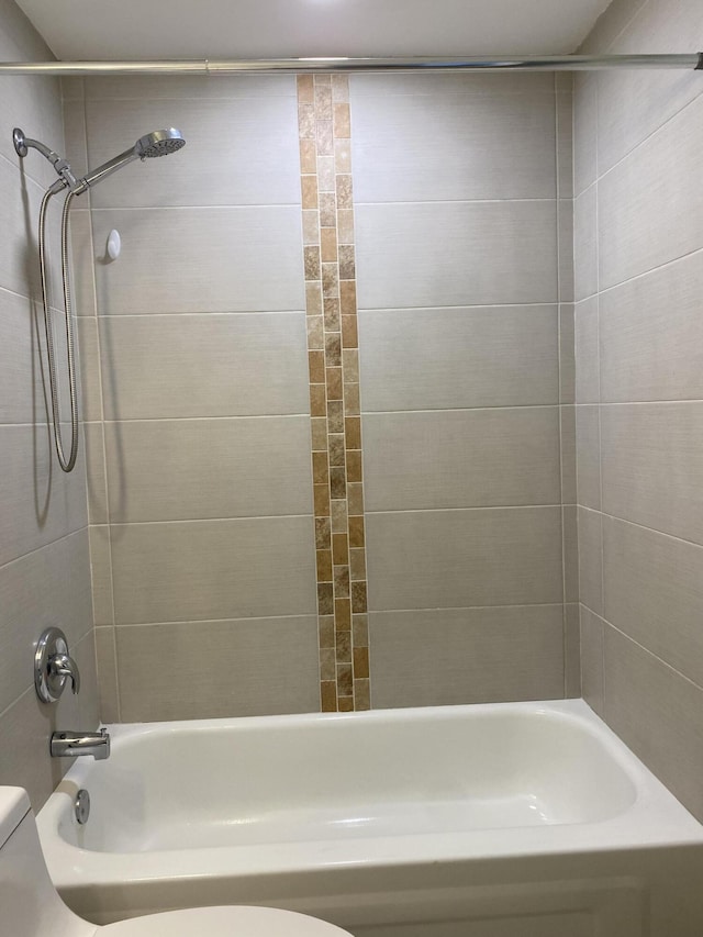 563 Capri L, Delray Beach, FL 33484 - bathroom featuring toilet and bathtub / shower combination