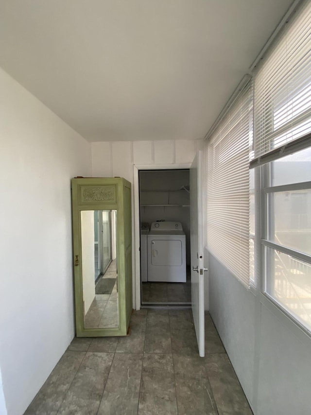 563 Capri L, Delray Beach, FL 33484 - corridor featuring independent washer and dryer
