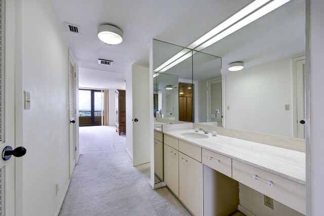 529 S Flagler Dr Unit 25F, West Palm Beach, FL 33401 - bathroom featuring vanity and visible vents