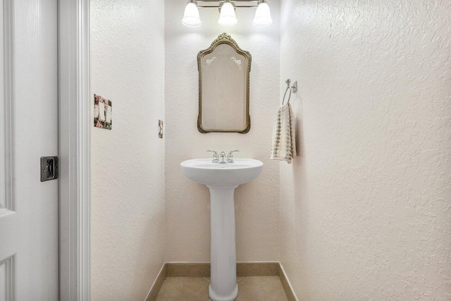 bathroom with baseboards